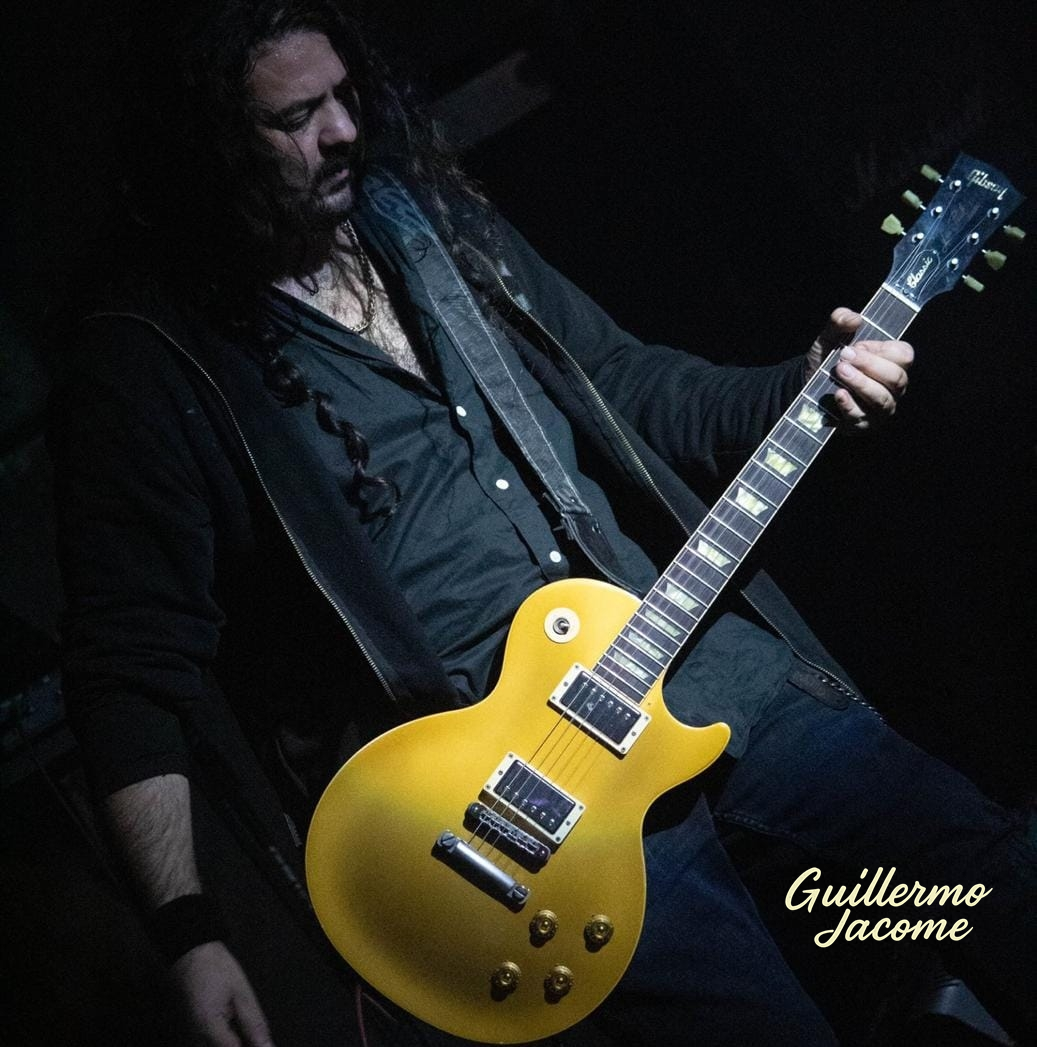 Guillermo playing guitar